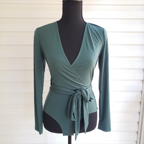 BCBGeneration Tops - Green long sleeve bodysuit size small